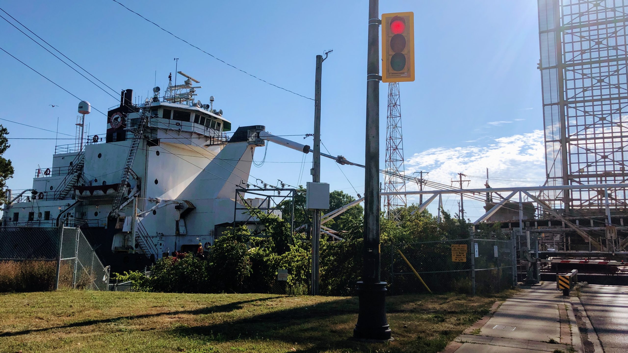 Boat passing through Bridge 19 of the Welland Canal in Port Colborne.