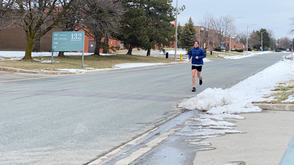 Photo of Me Running Down the Street in Shorts.