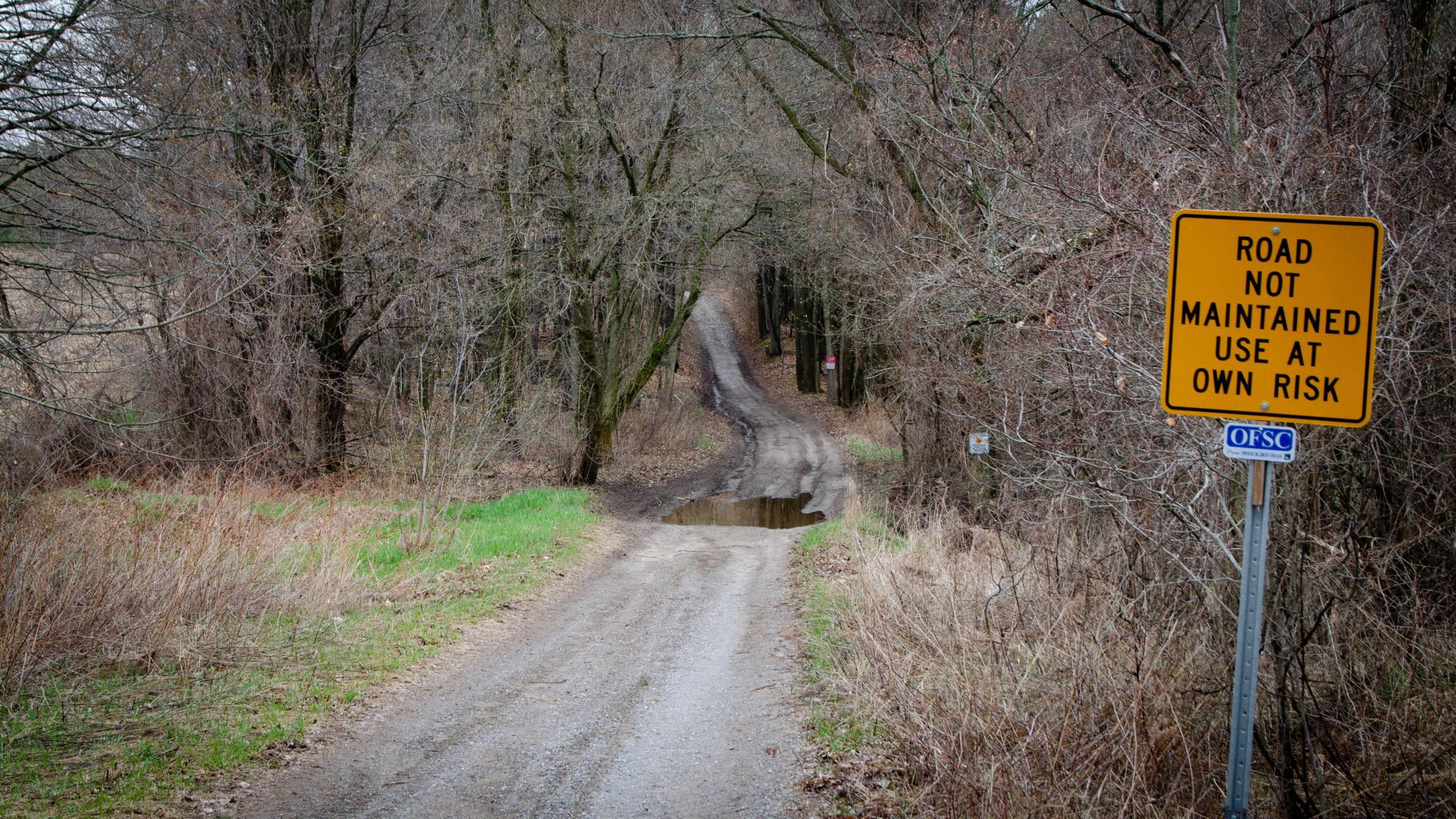 Road Not Maintained sign, on Ballyduff Rd, while riding the Tour of Scugog.