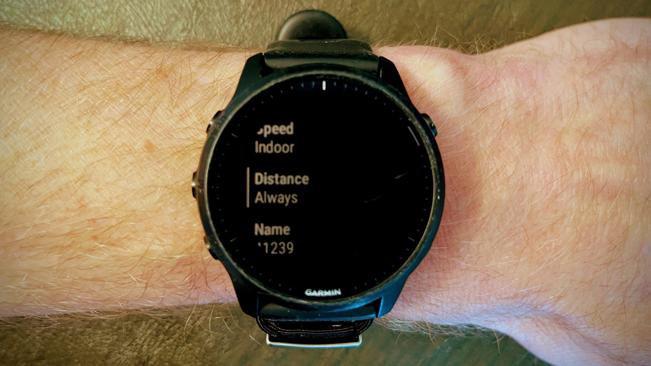 Picture of my Garmin watch and the Stryd distance setting that created PB confusion at the Toronto Marathon.