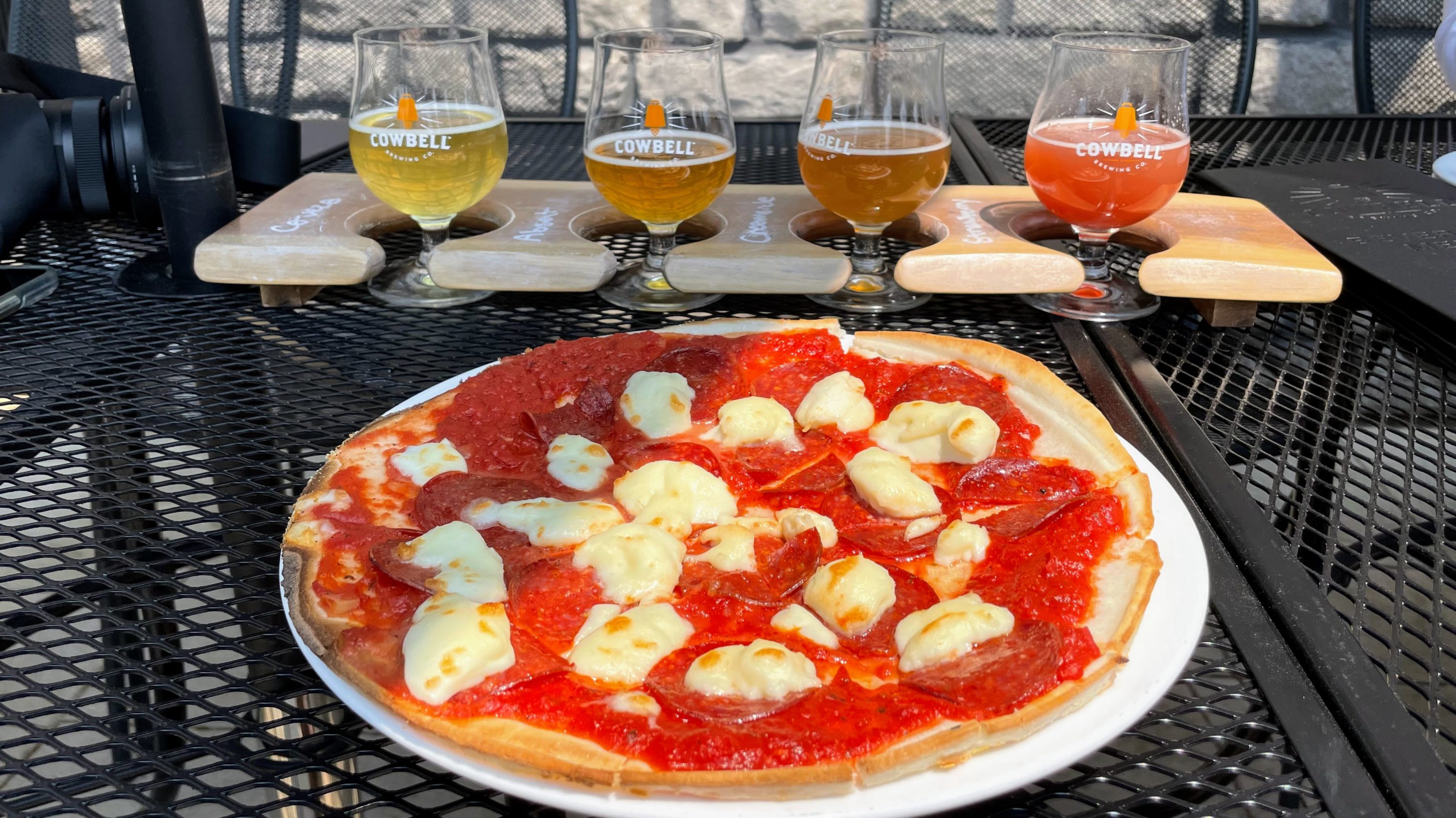 pizza and a flight of beers
